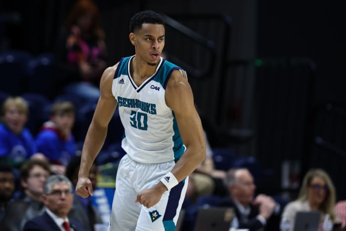 North Carolina-Wilmington Seahawks guard Jaylen Sims (30) celebrates after a play against the Delaware Fightin Blue Hens during the first half of the Colonial Conference Championship game at Entertainment and Sports Arena.